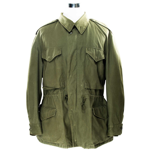 Vintage Us Army M51 Field Jacket 1951 Korean War Size Large Short

Pattern Date: 13 Sept. 1951
Spec. No. Mil-J-11448 (QMC)

The M-51 M1951 field jacket was an US Army four pockets jacket made of 9-ounce wind resistant, water repellent treated cotton sateen cloth in Olive Green Shade 107 (OG 107).